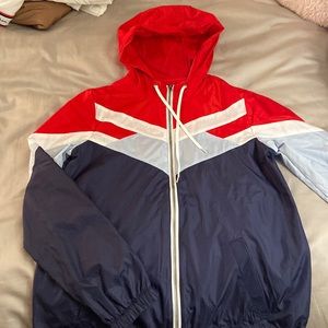 Zine windbreaker. Size small. Good quality.